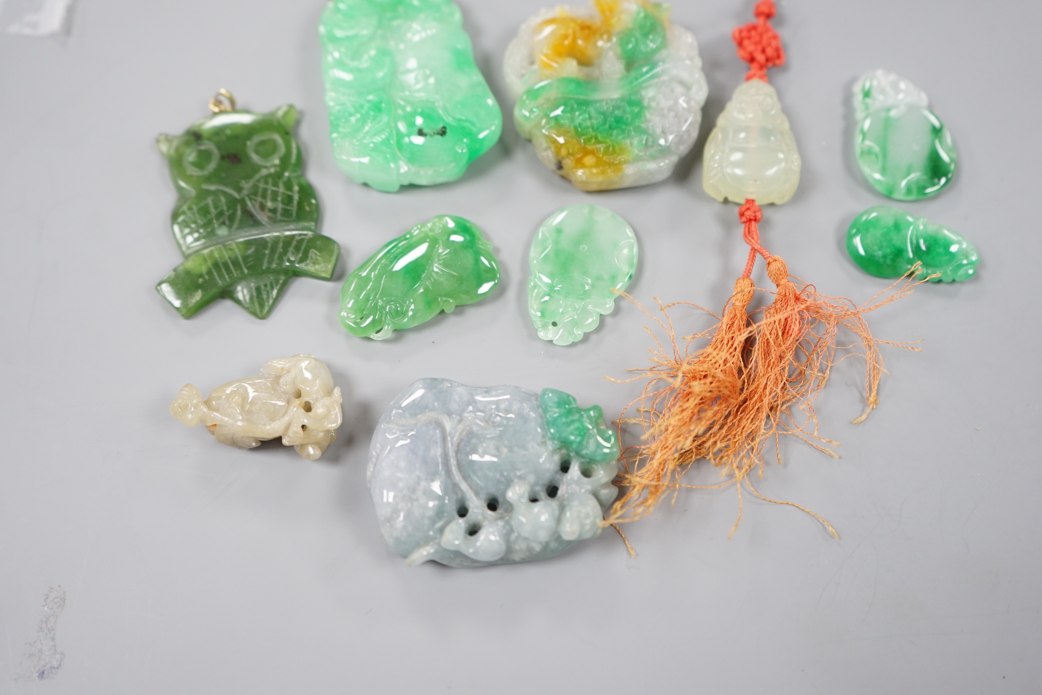 A group of ten jadeite and hardstone carvings and pendants